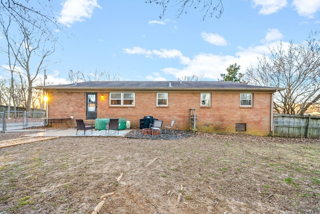 rear view of property with a patio area