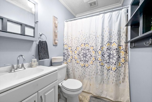 bathroom featuring crown molding, vanity, a textured ceiling, and toilet