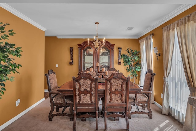 dining room with a notable chandelier, light colored carpet, and crown molding