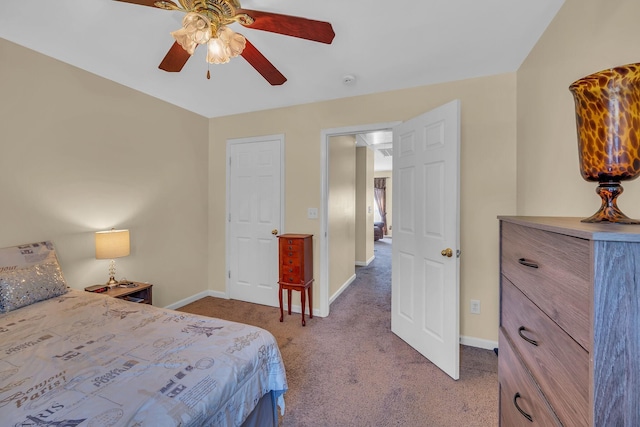 bedroom with light colored carpet and ceiling fan