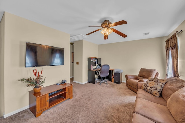 living room with carpet flooring and ceiling fan