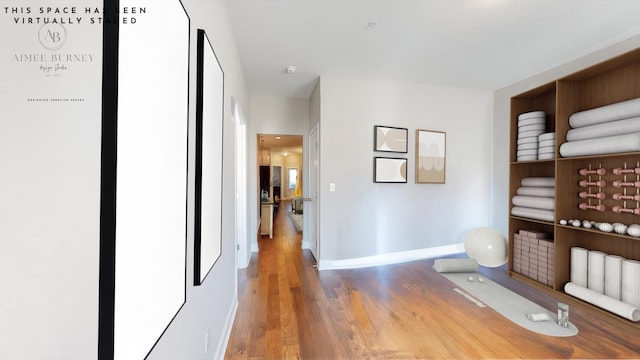 hallway featuring hardwood / wood-style floors