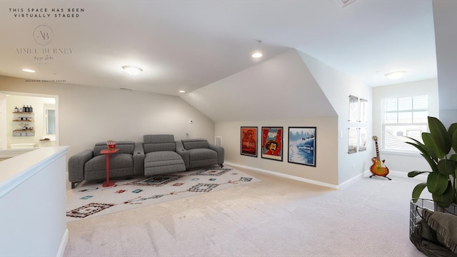 interior space featuring lofted ceiling and carpet floors