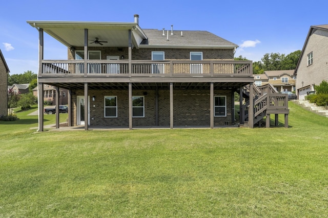 back of house with a lawn, ceiling fan, and a deck