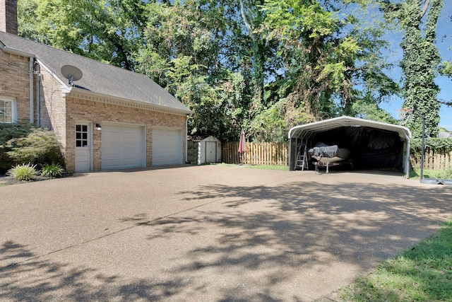 view of side of home featuring a carport and a storage unit