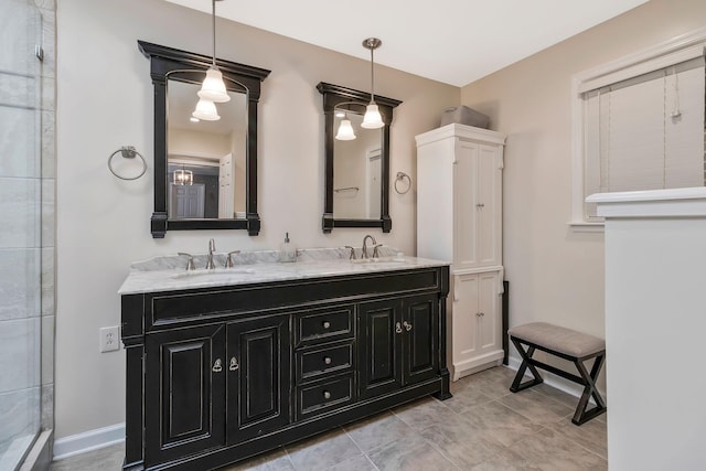 bathroom featuring vanity and a shower with door