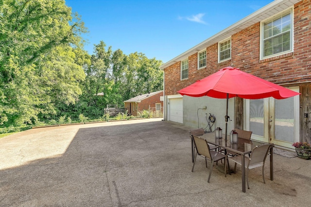 view of patio with a garage