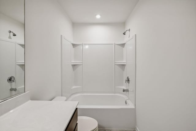 full bathroom featuring shower / tub combination, vanity, and toilet