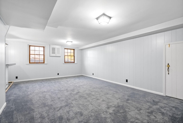 basement with dark carpet