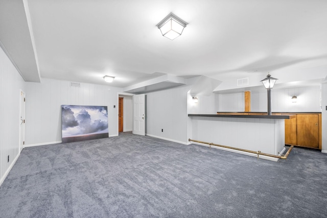 basement with dark carpet