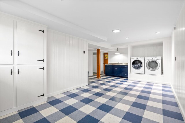 laundry area featuring separate washer and dryer and sink