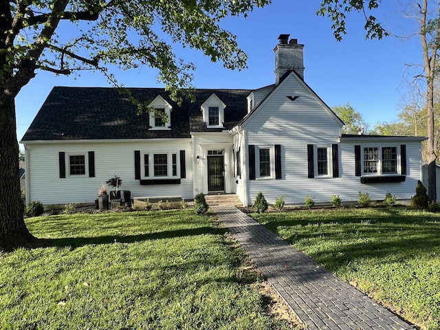178 E Glenwood Dr, Clarksville, TN 37040 - cape cod house with a front yard and a chimney
