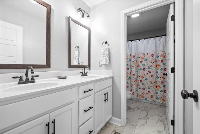 bathroom featuring a shower with curtain, vanity, and toilet