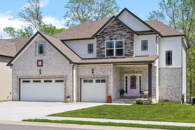 view of front of house featuring a garage and a front lawn