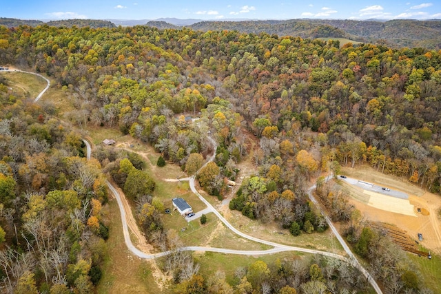 aerial view featuring a view of trees