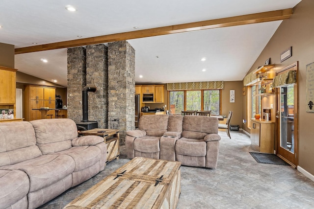 living area featuring recessed lighting, a wood stove, lofted ceiling with beams, and baseboards