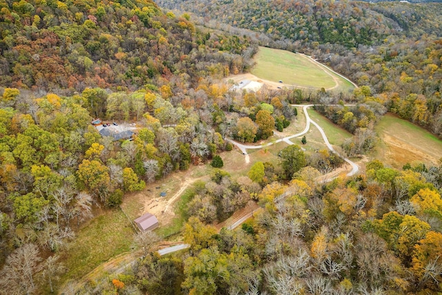 drone / aerial view with a view of trees