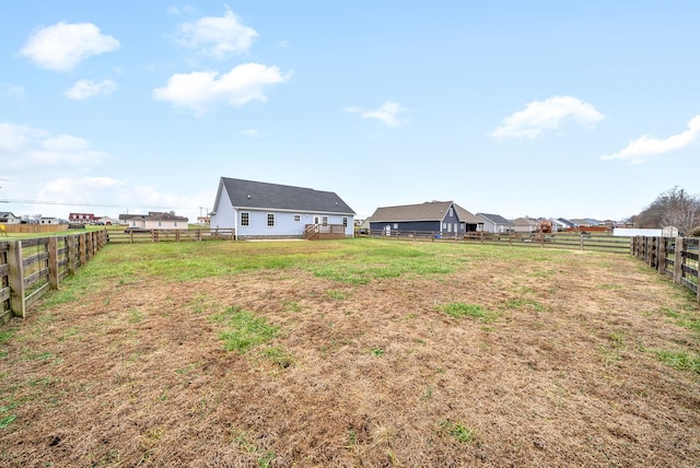 view of yard featuring a rural view