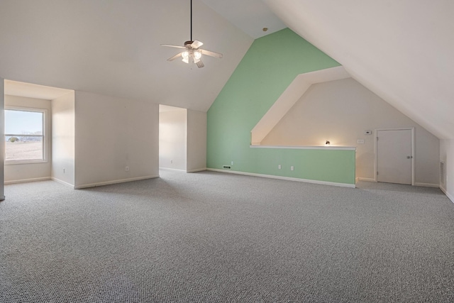 bonus room featuring vaulted ceiling, ceiling fan, and carpet