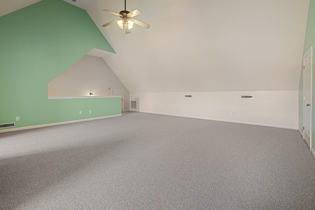 additional living space with lofted ceiling, carpet flooring, and ceiling fan