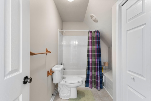 bathroom featuring tile patterned floors, shower / bath combo, and toilet