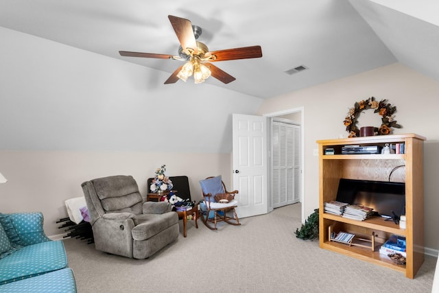 sitting room featuring carpet flooring, ceiling fan, and lofted ceiling