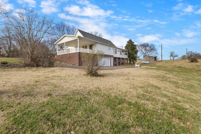 view of yard with a garage