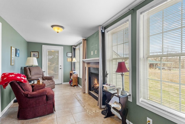 living area with light tile patterned floors