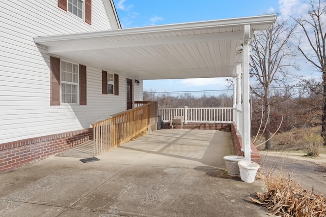 view of patio / terrace with a carport