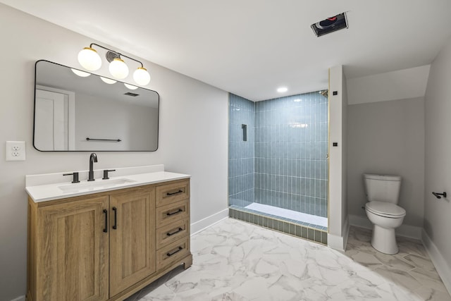 bathroom featuring baseboards, toilet, marble finish floor, and vanity