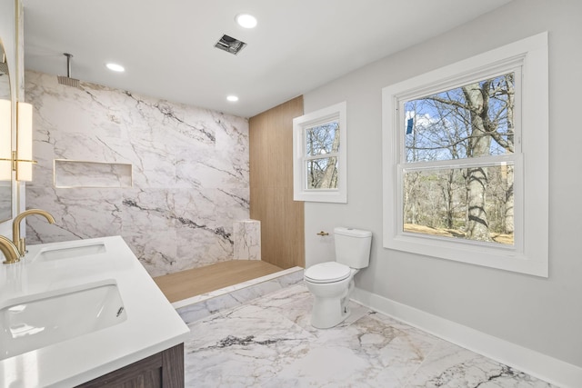 full bathroom with a sink, toilet, marble finish floor, and recessed lighting