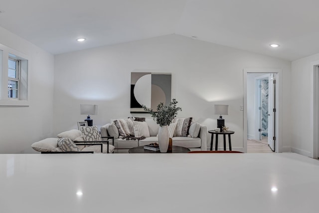 living room with lofted ceiling