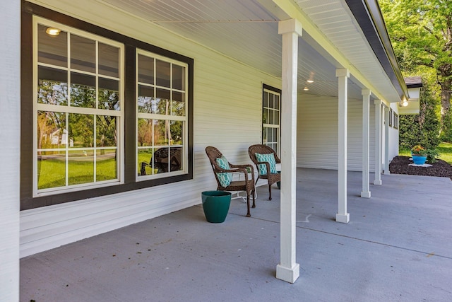 view of patio featuring a porch