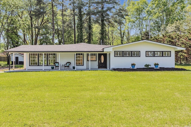 ranch-style home with a porch and a front yard