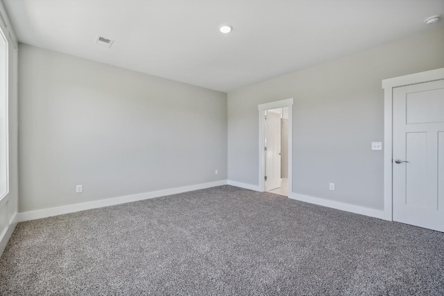 unfurnished room featuring carpet floors