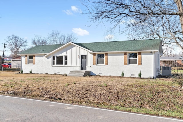 view of front of home featuring central air condition unit