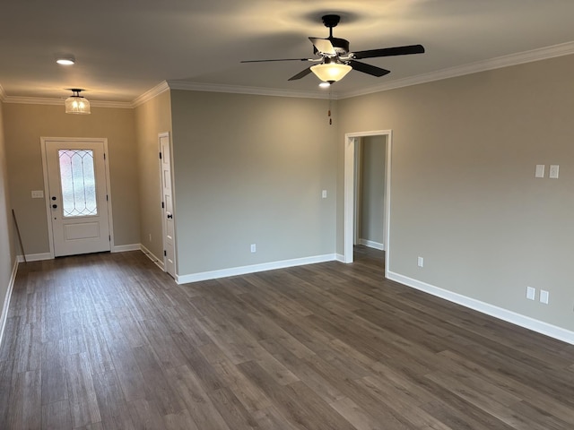 foyer entrance with crown molding, ceiling fan, and dark hardwood / wood-style flooring