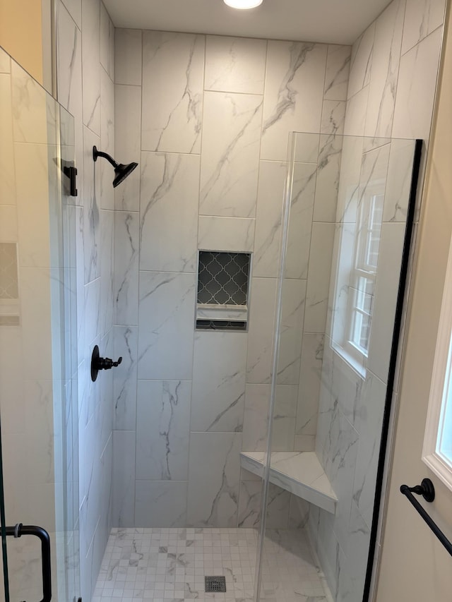 bathroom featuring walk in shower