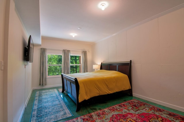 bedroom featuring crown molding