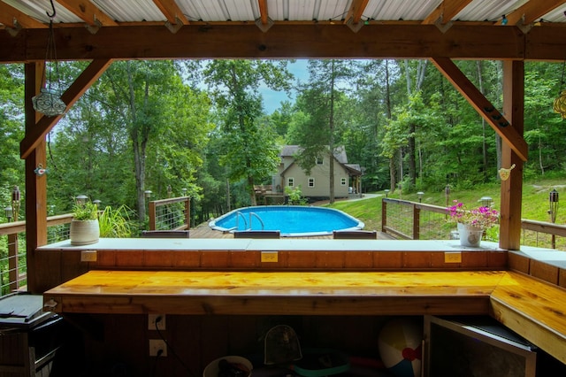 view of pool featuring a deck