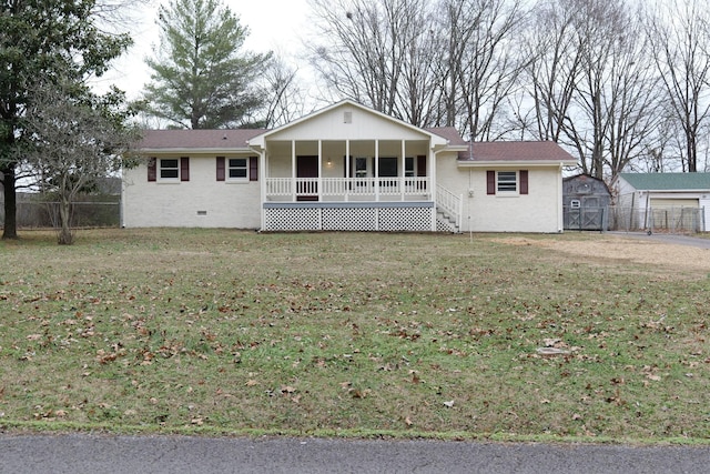 single story home with a porch and a front lawn