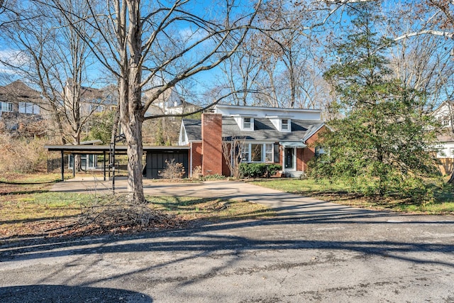 view of front of property with a carport