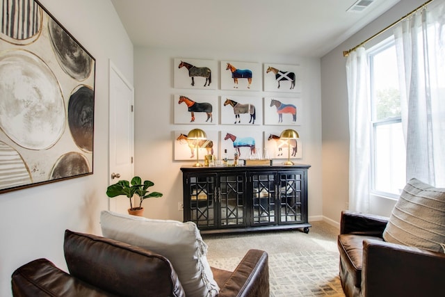 interior space with a wealth of natural light and carpet