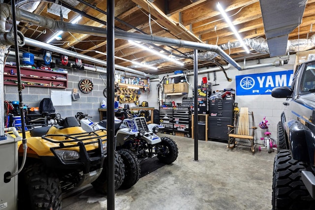 garage featuring a workshop area