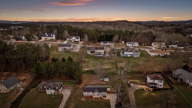 view of aerial view at dusk