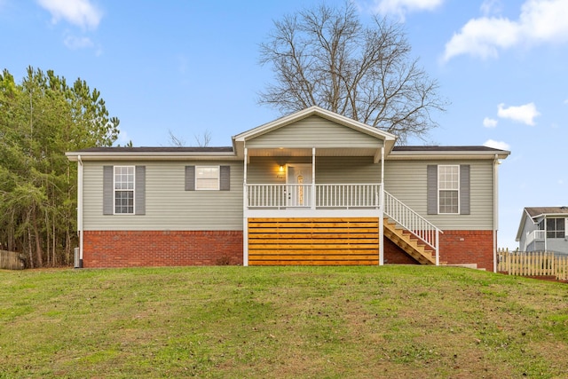 view of front of property with a front lawn and a porch