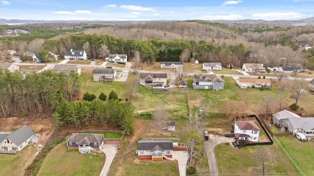 drone / aerial view featuring a mountain view