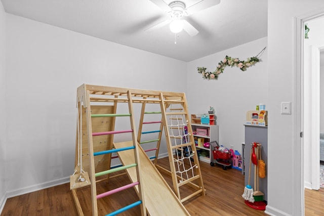 bedroom with ceiling fan and wood-type flooring