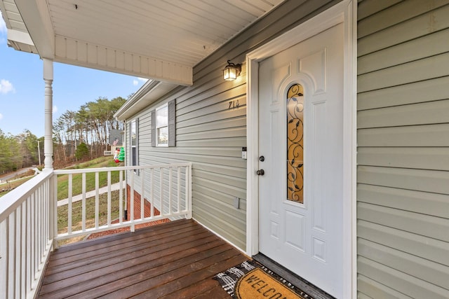 doorway to property featuring a porch