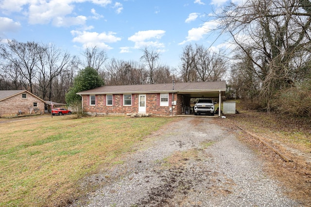 view of front of house featuring a front yard and a carport